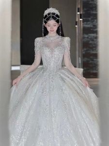 Vestido de novia de lujo para novia Vestido brillante y brillante Manga larga Vestidos de novia Vestidos de novia Árabe Dubai Catedral Tren Por encargo Sin espalda Bling Tren de barrido Vestido de novia