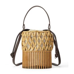 Bolsos de lujo para mujer, bolso tejido hecho a mano de diseñador, bolso de bambú, bolso de mano con costuras, bolso de cubo, bolso de playa de vacaciones de Bali hueco, bolso de mano 230328