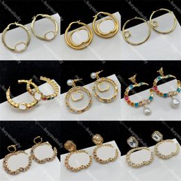 Mujeres de lujo G Studs Diseñador Pendientes de aro de oro Diamante Letras dobles Círculo Gotas para los oídos Dangler Regalo de cumpleaños
