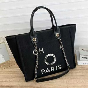 Sac de plage en toile pour femmes de luxe fourre-tout sacs à main classiques grands sacs à dos capacité petits paquets de chaîne grand bandoulière C72D 70% Designer Outlet vente