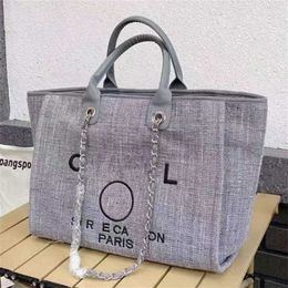 Bolsa de praia feminina de luxo bordada à mão com pérolas grandes mochilas pequenas femininas mochila de corrente de lona bolsas de noite WTI4 60% saída de fábrica