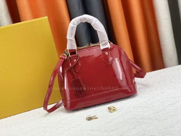 Sac à main de luxe pour femme Sac fourre-tout à la mode Miroir en cuir verni Shell chignon fleur Lettre impression sacs à bandoulière 25 cm Sac de créateurs classiques Sac à bandoulière pour femme