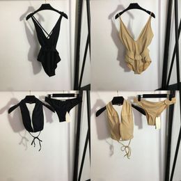 Diseñador de trajes de baño de lujo para mujer Traje de baño de una pieza para mujer Traje de baño dividido con relleno sexy con cinturón INS Moda Trajes de baño con cuello en V profundo Bikinis