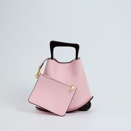 Luxe houten handtas Veelzijdige bucket chic Groentenmand Damestas Grensoverschrijdend Nieuw Lente/Zomer Mode Bucket Bag Trend Macaron Crossbody Tas wit roze