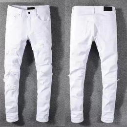 Luxurys diseñador para hombres jeans famosos diseño dasual de la pierna delgada de bordado de la serpiente pantalones de verano pantalones de lápiz 29-40276T