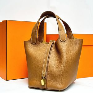 Sac à main et sac à main pour femme Sacs de créateurs Luxurys Panier Pochette Sac à bandoulière Homme Cuir Marron Lock Maquillage Voyage Embrayage Seau Sacs à couches sous les bras