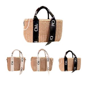 Luxurys Designer fourre-tout woody Stuff Sacks tissage Sacs de plage Sacs à main Femmes cross body pompon été Raphia vacances voyage Sacs à bandoulière Paille hommes week-end sacs