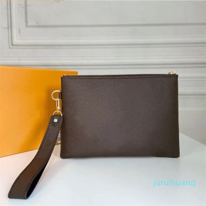 Luxurys Designers Pochette Femmes Portefeuilles Sacs à poignet Pochettes clés Toile enduite Hommes Porte-monnaie Stockage