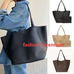 Diseñadores de lujo Hombro La fila Bolsas de asas para mujer para hombre Madre Bolso blanco Shopper Viaje Bolsa de axila Embrague Trabajo Moda Cruzado Axila Weekender-1