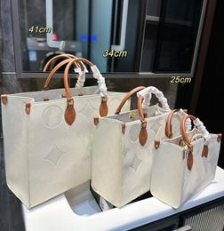 luxe handtassen shopper tas handtas draagtas voor onderweg GM MM PM OnTheGo Tote Large Bruin wit Emboss Mummy Bag Luxurys Handtassen Totes 41cm 34cm 25cm voor onderweg