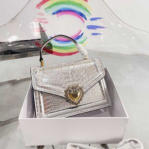 Luxurys Silver Handbags Femme Sac Sac en cuir Sac de soirée Femme Femme Femme Hands Small Heart Messenger Mini sacs Fashion Sacs