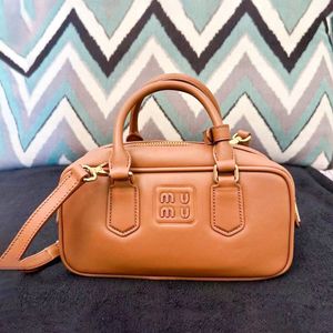 Dames echte lederen tote luxurys designer tas mode heren handtas bovenste handgreep crossbody bowling tas lady sling tankje kluis hoogwaardige schouderbaguette tassen