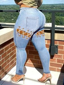LW plus taille de rue décontractée Femmes d'automne hiver stress stress solide solid bandage creuse-zipper mouche skinny Design jeans 240320
