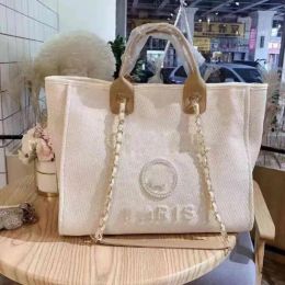 M designertas dames Tassen klassieke draagtas Strandhandtas Bloem laser Bakken Verblinden Kleur Winkelen PVC Portemonnees Transparante Bakken Jelly canva