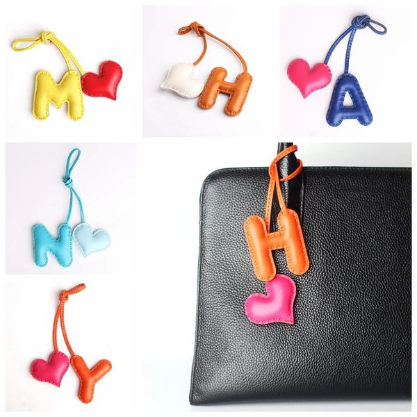 M H W A Y N F coeur de luxe en cuir véritable lettre anglaise porte-clés pour pendentif de voiture porte-clés femmes sac breloques accessoires 240110
