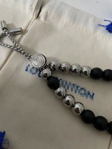 M00512 bracelet perles monogramme pour homme créateur luxe