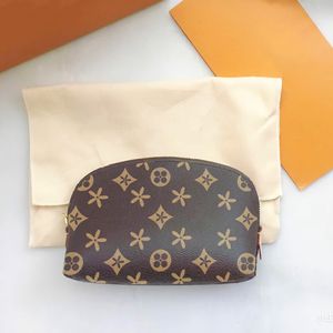 M47515 bolso de mano de lujo bolsa de maquillaje Pochette de diseñador para hombres y mujeres Bolsa de cosméticos Bolsa de lavado de hombro de cuero genuino bolsa de maquillaje flor marrón Cremallera Kits de artículos de tocador bolsas