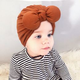 M611 Nuevo infantil para niñas para bebés gorro de algodón arco cebo color dulzura niño niño niño gordo turban knot sombreros niños accesorios para el cabello 9 colores