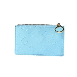 M82045 Mujeres Luxurys diseñadores Tass de tarjetas Bolsas billeteras bolsas de color sólido billeteras de viaje de cuero genuino monedas de monedas 8x14.5x1 con caja de regalo