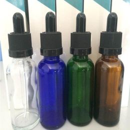 Hecho en China 660pcs/lote Botellas de medicina de vidrio 30 ml de aceite e-liquid de aceite con tapa negra a prueba de niños y tubo de pipeta de vidrio NBWHH