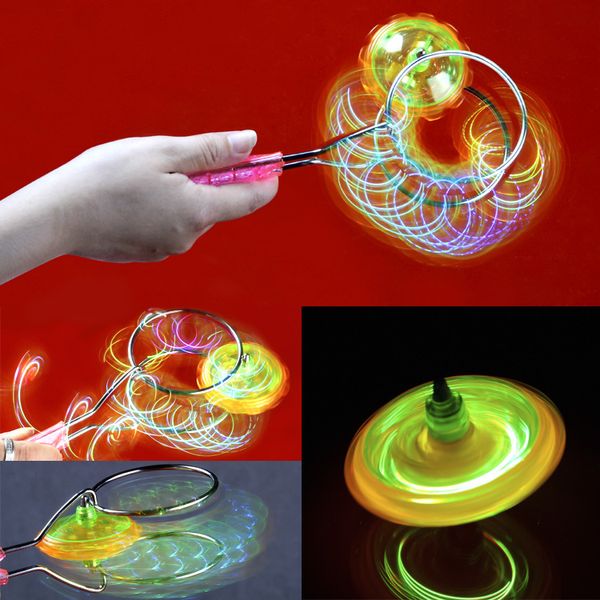 Magia volando alrededor del mercado nocturno puesto de venta de juguetes para niños giroscopio luz flash nuevo imán Yo Spinning Top