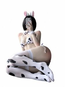 Maid Cosplay Disfraces eróticos Cola de vaca Mujeres Lencería sexy Lindo Juego de rol de tres puntos Passi Traje Sujetador y panty Conjunto Medias Q8Nf #