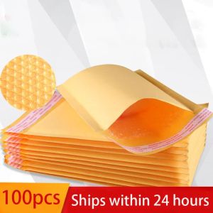 Envoyez des envoyeurs 100pcs / set kraft papier enveloppes de bulles sacs différentes spécifications Enveloppe d'expédition rembourrée avec sac de diffusion à bulles