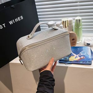 Make -uptas Nieuwe draagbare toiletpakketten met grote capaciteit Zipper Partitie vrouwelijke multifunctionele textuur PU toiletiekas draagbaar