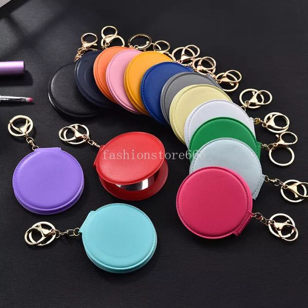 Miroir de maquillage porte-clés porte-clés de voiture en cuir PU anneaux double face pliant rond femmes sac pendentif Portable mode porte-clés charmes bijoux accessoires