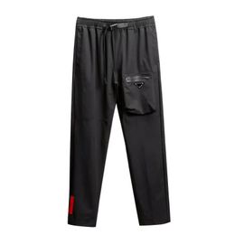 Pantalones casuales para hombre, pantalones para correr, pantalones deportivos, pantalones bordados, bolsillo con cordón, prendas de vestir ajustadas, pantalones de chándal Capris, M-3XL asiática