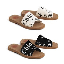 Diseñador de hombre sandalio amaderado mula tobogán plano lujo sandale flip flop lienzo tazz slipper mujer zapato rosa letra zapatilla casual plataforma dhgate summer playa zapatos