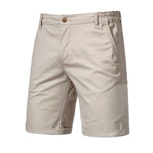 Man Shorts 2021 Nieuwe zomer 100% katoen vaste hoogwaardige casual zakelijke zakelijke zakelijke sociale elastische taille mannen 10 kleuren strand shorts lopende mandba
