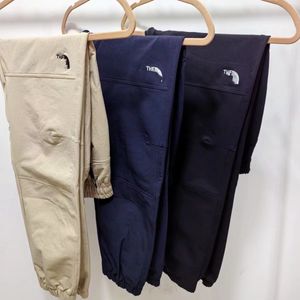 Pantalones de chándal para hombres Sport Sport Pantrajes de entrenamiento de jogging de secado rápido primavera y verano NUEVA Marca de moda Joggers de carga casual