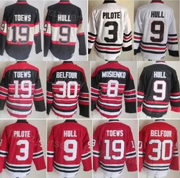 Homme Vintage Hockey 19 Jonathan Toews Jersey Rétro Classique 3 Pierre Pilote 9 Bobby Hull 8 Bill Mosienko 30 Ed Belfour 18 Denis Savard CCM Retraite Noir Rouge Blanc Couture