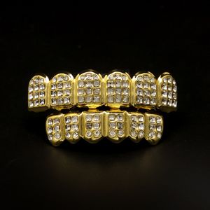 Les fabricants de grilles Grillz en or véritable insèrent une prothèse dentaire en diamant avec un ensemble de dents de bijoux Hip Hop en or