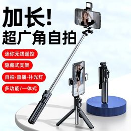 Fabricants en gros de nouveau tiktok bluetooth selfie stick téléphone mobile universal caméra artefact remplit trépied lumineux