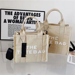 Marc the Tote Canvas Bolsa de compras Lady Designer Práctico Gran capacidad Bolsos de hombro cruzados lisos Carteras para mujer Moneda Pur258B