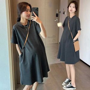 Robes de maternité style coréen plus taille femme enceinte vêtements de couleur solide manches courtes en vrac décontracté de maternité de maternité étirée mini robe h240518