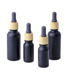 Bouteilles d'huile de fumée noire mate e bouteilles de liquide en verre bouteille de parfum d'huile essentielle flacons compte-gouttes de pipette de réactif liquide avec grain de bois C3047873