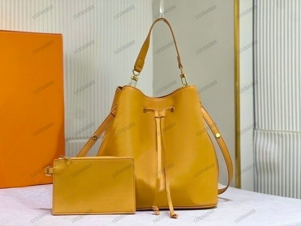 NEONOE MM Bolso con cordón: Bolso tipo cubo con monogramas en relieve para mujer - Bolso bandolera de diseñador amarillo lujoso con estilo