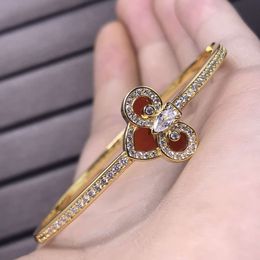 mcqeen ontwerper Qeelins luxe sieraden Chinese stijl rode agaat Ruyi Lock Iris bloemarmband damesins ingelegd met volledige diamanten sleutelarmband