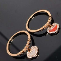 Mcqeen designer Qeelins bijoux de luxe incrusté d'agate rouge Ruyi Lock Ring avec v plaqué or 18 carats à la mode et personnalisé index léger luxe et unique D