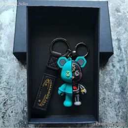 Personalidad de oso mecánico Keychains para hombres para hombres Lindo juguete de dibujos animados pareja casual de cadena de llave colgante de la marca diseñadores de regalos llavero marido marido nauflaon 1648