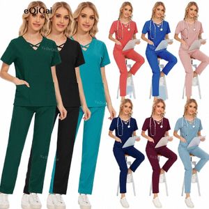 Blouses médicales Pocket Tops Pantalons droits Scrubs Femmes Set Uniformes de soins infirmiers Beauté Sal Workwear Médecin Infirmière Clinique Workwear R2pY #