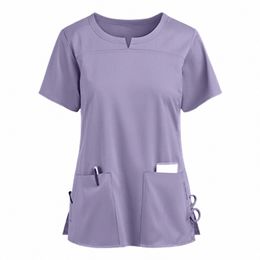 Uniforme médical Infirmière Femmes Scrubs Tops Manches courtes Travailleurs de poche Uniforme de travail Pulls Travailleurs infirmiers Scrubs Accories Z7UJ #