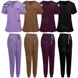 Uniforme médical Vêtements de travail de couleur unie Accories d'hôpital Vêtements médicaux de haute qualité pour femmes hommes Dentiste Scrub WorkWear K2cn #