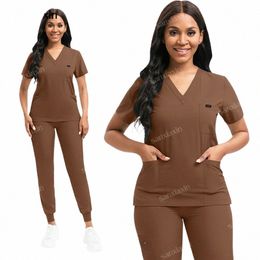 Uniformes médicos Traje exfoliante elástico Hospital Uniforme Clínica Quirófano Ropa de trabajo Tallas grandes Conjunto de pantalones Jogger Top S-XXL t3XI #