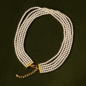 Collier de perles en verre Swarovski vintage médiéval à cinq couches avec automne et hiver Français design perle de riz chaîne de clavicule de luxe légère