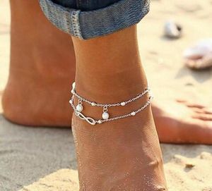 Bracelet de cheville Crystal Metpcute Bracelet de chaîne de liaison en argent sur la jambe pour les femmes à la plage avec des bijoux de pied 2397419