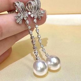 Meibapj 10-11 mm Natural White Rice Pearls Fashion Bow Boucles d'oreilles à longue chaîne 925 Bijoux de mariage fin en argent pour femmes 240516